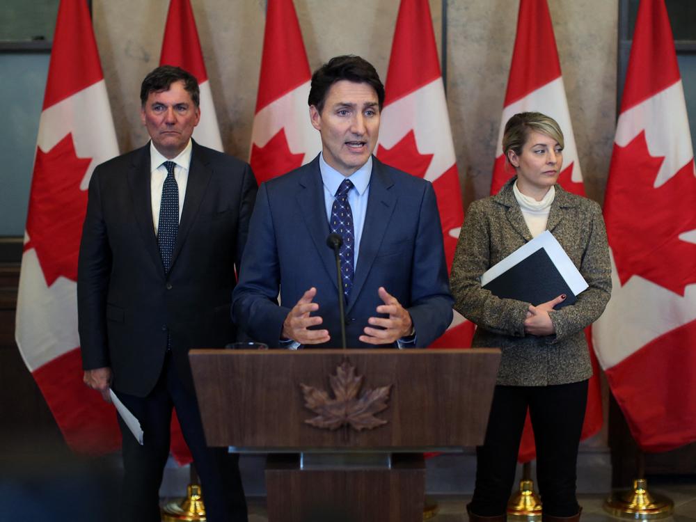 Canadian Prime Minister Justin Trudeau with Foreign Minister Mélanie Joly (right) and Public Safety Minister Dominic LeBlanc speaks during a press conference on October 14 in Ottawa, after Canada expelled six top Indian diplomats.