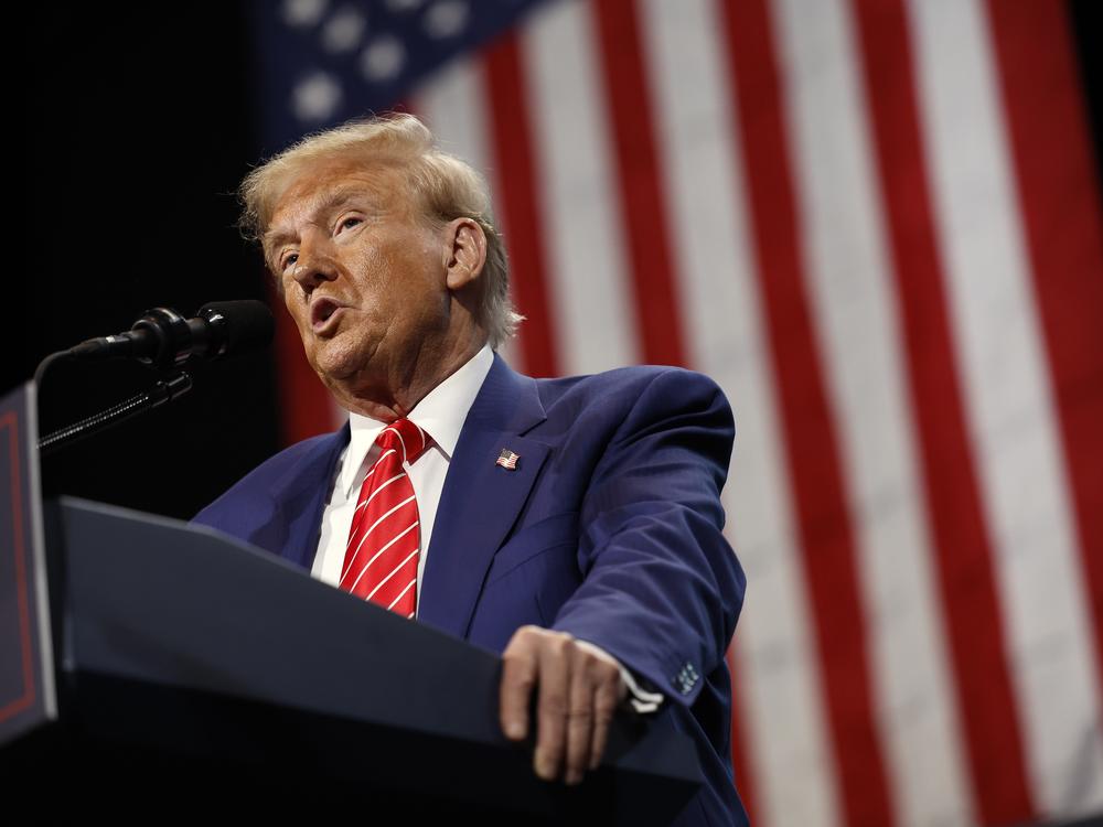 Former President Donald Trump delivers remarks during a campaign rally in Atlanta on Oct. 15. With the election in its closing weeks, Trump and other Republican candidates have been  focusing many of their campaign ads around the issue of transgender rights.
