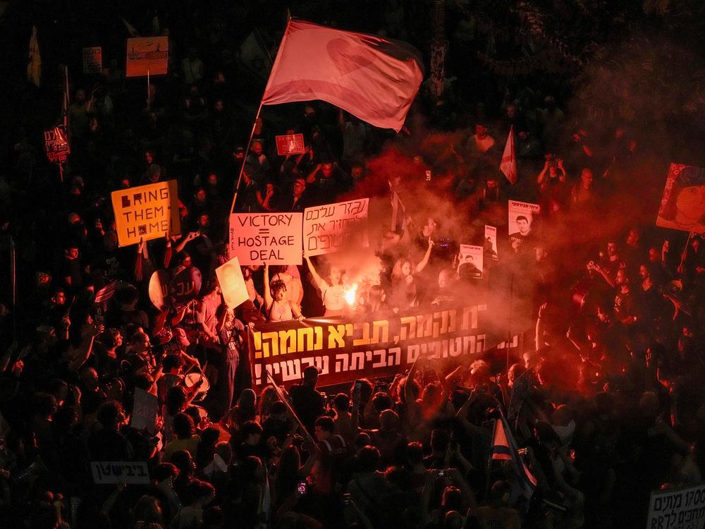 People protest against Prime Minister Benjamin Netanyahu's government and call for the release of hostages held in the Gaza Strip by the Hamas militant group, in Tel Aviv, Israel, Saturday, Oct. 19, 2024.