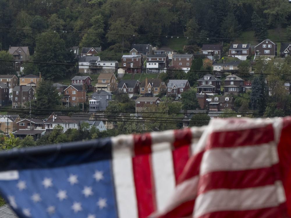 Houses across the Monongahela River are seen from Braddock, Pa., on Oct. 16, 2024.