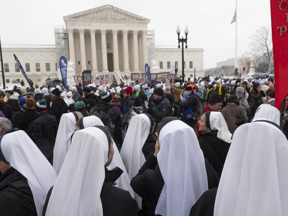 Demonstrators participate in the March For Life anti abortion rally in front of the US Supreme Court in Washington, DC on January 19, 2024.