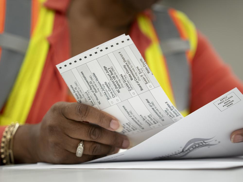 Absentee ballots are prepared to be mailed at the Wake County Board of Elections on Sept. 17 in Raleigh, N.C.