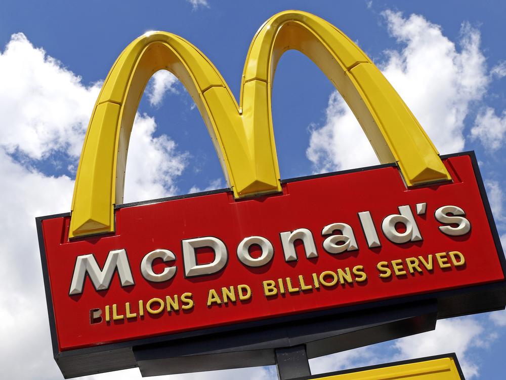 A sign outside a McDonald's restaurant is seen in Pittsburgh, on June 25, 2019. E. coli food poisoning linked to McDonald’s Quarter Pounder hamburgers has sickened at least 49 people in 10 states, including one person who died and 10 who were hospitalized.