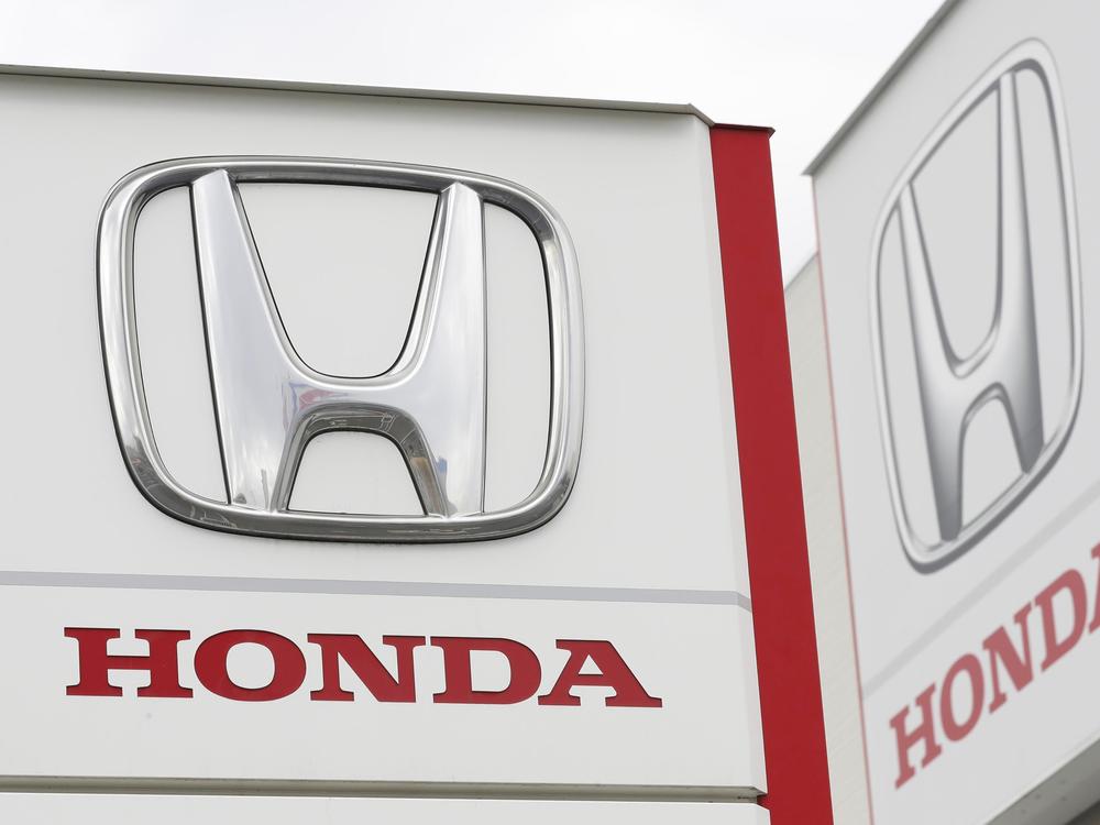 Honda Motor Co. logos are pictured in Tsukuba, northeast of Tokyo, on Feb. 13, 2019. The automaker is recalling more than 700,000 vehicles over fuel pumps that may crack and leak fuel, which could increase the risk of a fire.