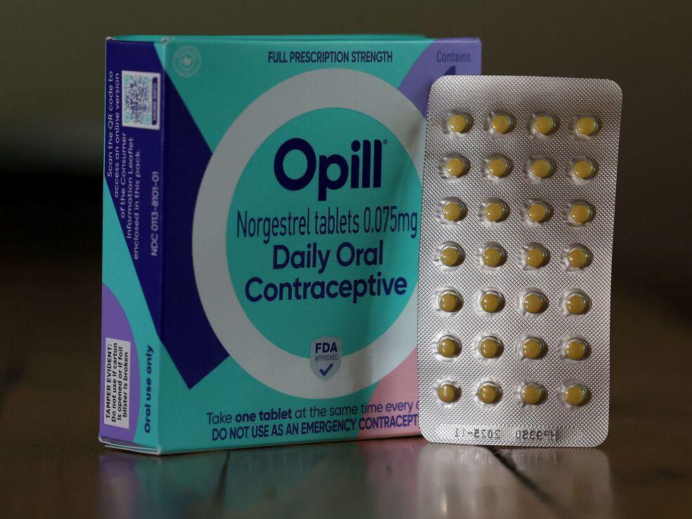 In this photo illustration, a package of Opill is displayed on March 22.
