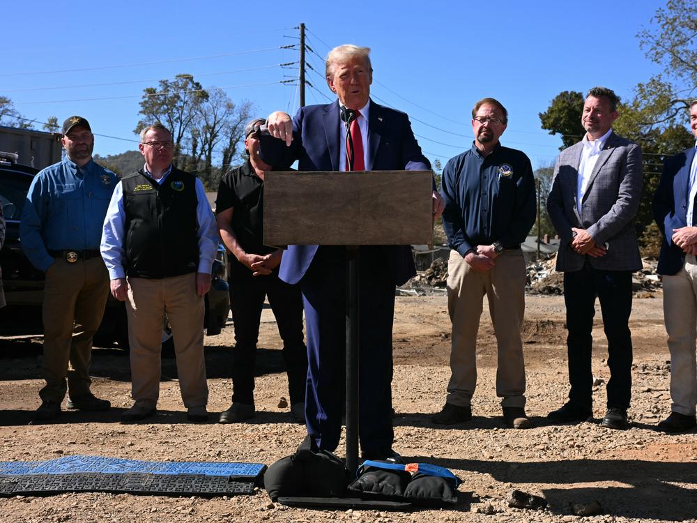 Former President Trump speaks to the media in Swannanoa, N.C., on Monday after observing cleanup efforts in the aftermath of Hurricane Helene.