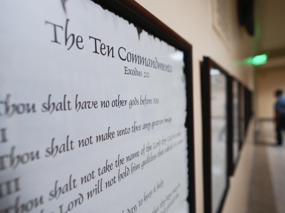 A copy of the Ten Commandments is posted along with other historical documents in a hallway of the Georgia Capitol on Thursday, June 20, in Atlanta.