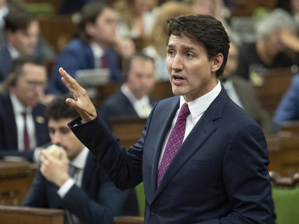 Canada Prime Minister Justin Trudeau rises during Question Period in Ottawa, Tuesday, Oct. 22, 2024.
