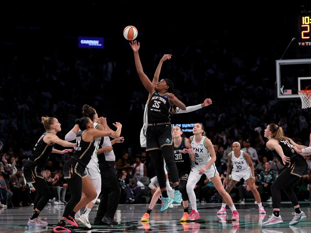 Jonquel Jones #35 of the New York Liberty and Kayla McBride #21 of the Minnesota Lynx tip off to start Game Five of the WNBA Finals on Sunday. The Liberty defeated Minnesota in overtime to win the championship. Now the league's Players Association has opted out of its contract to secure higher pay.