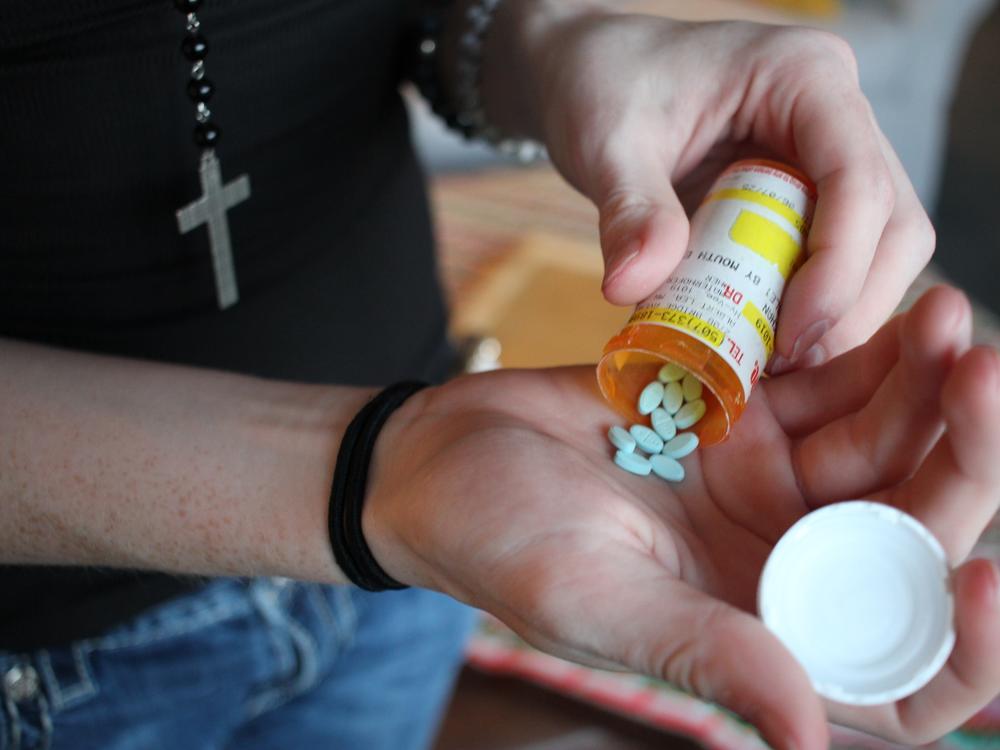 Veronica, 17, of Des Moines, Iowa, with her estrogen pills. A new study shows a very low rate of regret among kids taking puberty blockers or hormones as part of gender-affirming care.