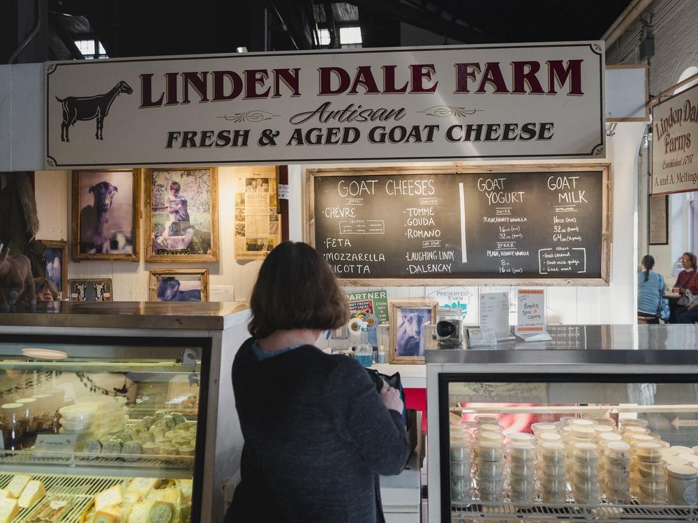 A shopper visits the Linden Dale Farm shop at the Lancaster Central Market in Lancaster, PA, on Friday, October 18, 2024.