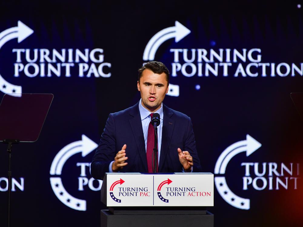 Turning Point's Charlie Kirk speaks at a rally for former President Donald Trump at Dream City Church in Phoenix on June 6.