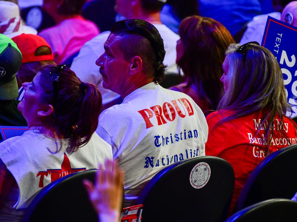 A man wearing a shirt that says 