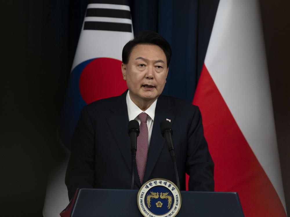 South Korean President Yoon Suk Yeol speaks during a joint press conference with Poland's President Andrzej Duda (not seen in the photo) at the Presidential Office in Seoul, South Korea, Thursday.