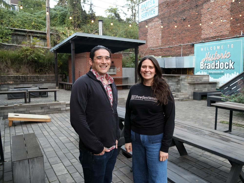 Braddock Public House co-owners Matt Katase (left) and Alaina Webber pose for a portrait on the patio of their restaurant on Oct. 16, 2024.