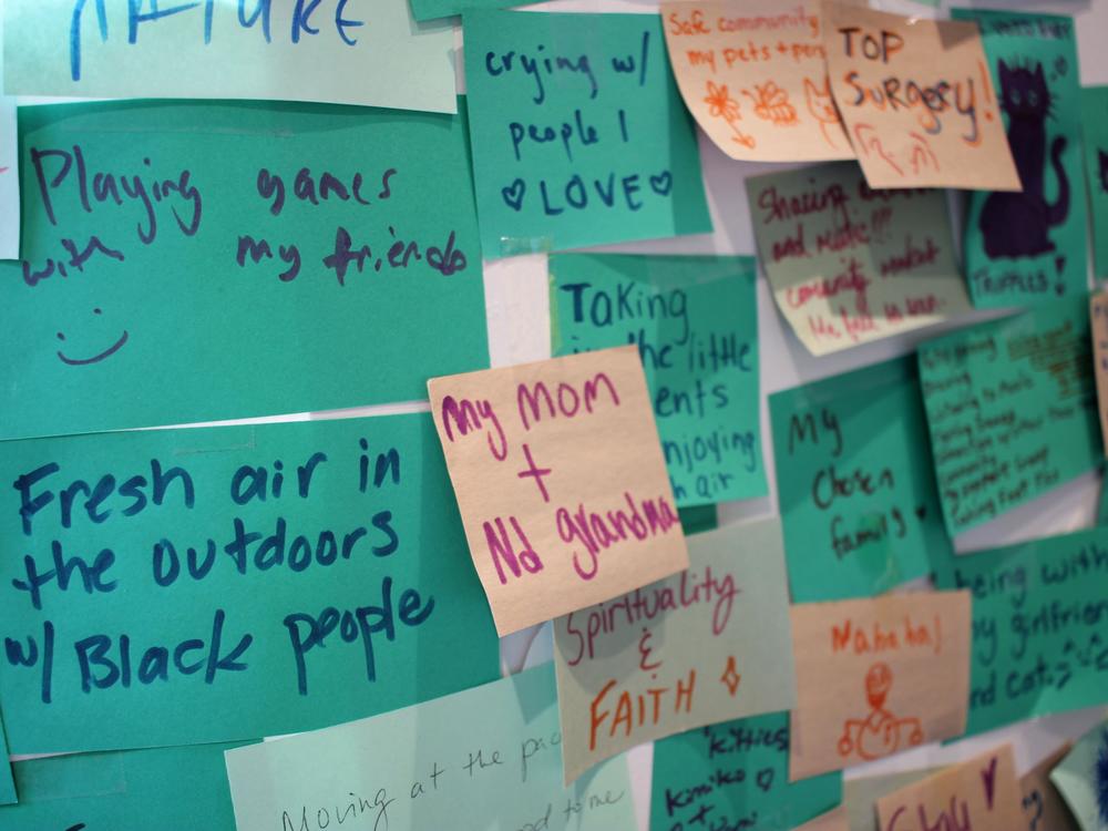 The Family Tree clinic waiting room showcases responses from patients to the question: “Where does your healing come from?”