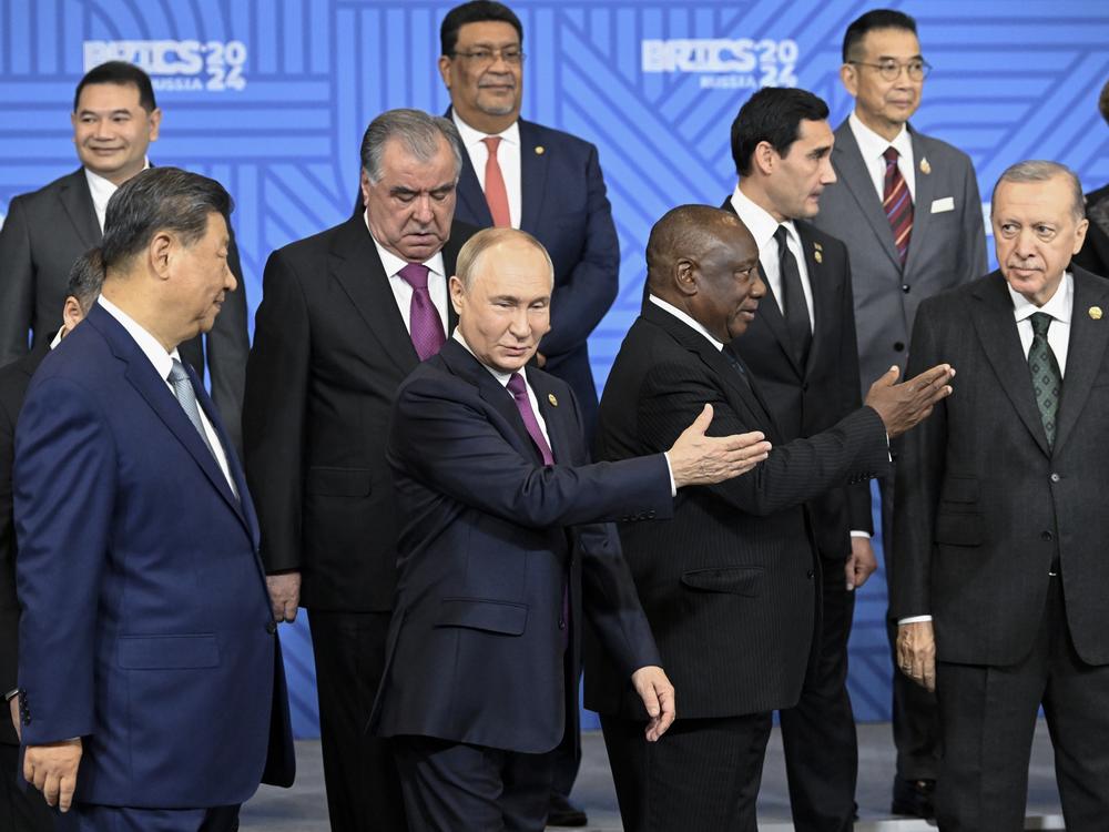 From left, Chinese President Xi Jinping, Russian President Vladimir Putin, South African President Cyril Ramaphosa and Turkish President Recep Tayyip Erdogan attend a family photo ceremony prior to Outreach/BRICS Plus format session at the BRICS Summit in Kazan, Russia, Thursday, Oct. 24, 2024.