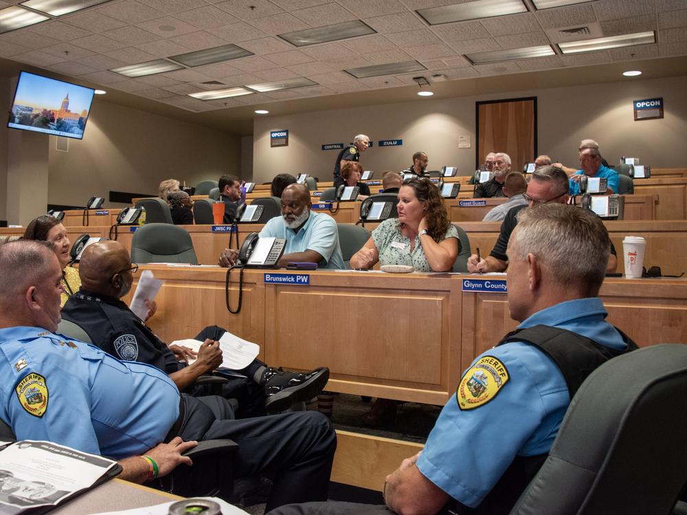 Law enforcement officers and poll managers in the coastal Georgia town of Brunswick discuss different threat scenarios during a class organized by the Committee for Safe and Secure Elections (CSSE) and the Georgia Secretary of State’s Office.