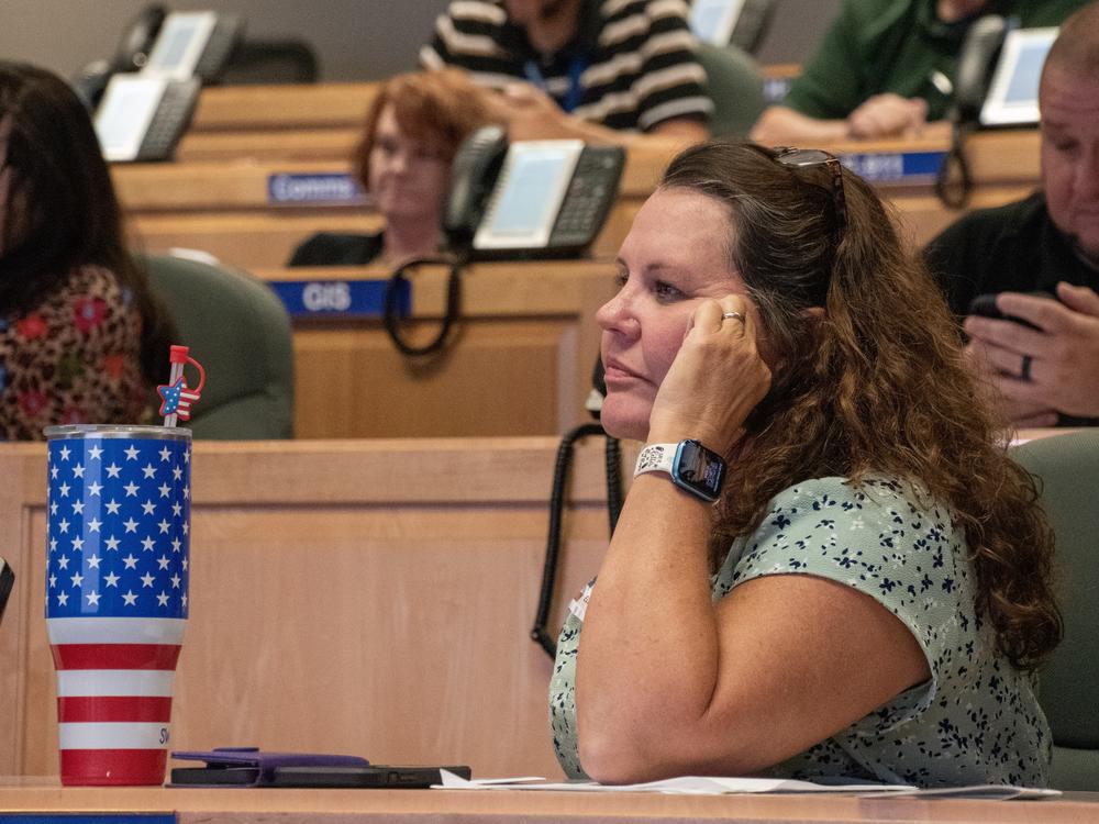 A poll manager listens to a presentation by the Committee for Safe and Secure Elections (CSSE) and the Georgia Secretary of State’s Office in the coastal Georgia town of Brunswick.