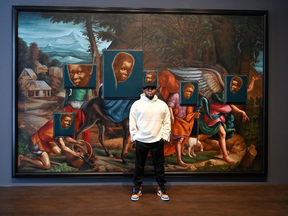 Artist Titus Kaphar has a new film out called<em> Exhibiting Forgiveness. </em>He's shown above with his artwork <em>From Whence I Came, </em>ahead of his 2022 exhibition at the Gagosian, Grosvenor Hill gallery in London.