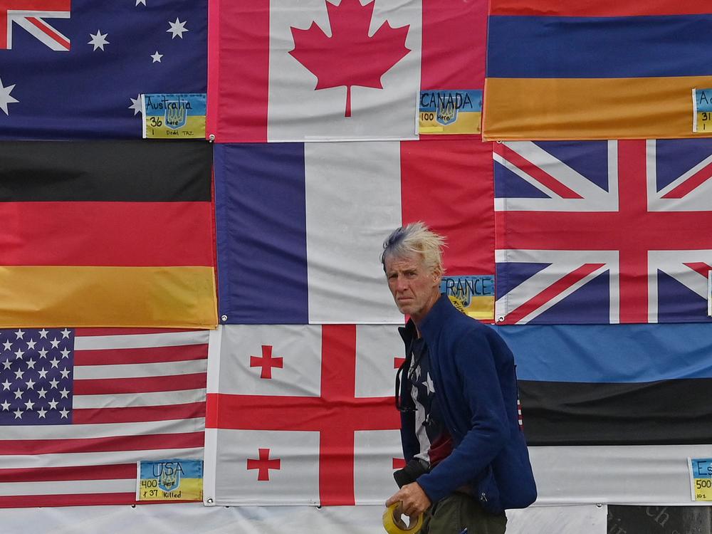 This photograph taken on June 23, 2022 in Ukraine, shows U.S. citizen Ryan Routh sticking up national flags of the countries helping Ukraine. Routh, now 58, faces federal charges on the attempted assassination of former President Donald Trump at his West Palm Beach, Fla. golf course on September 15, 2024.