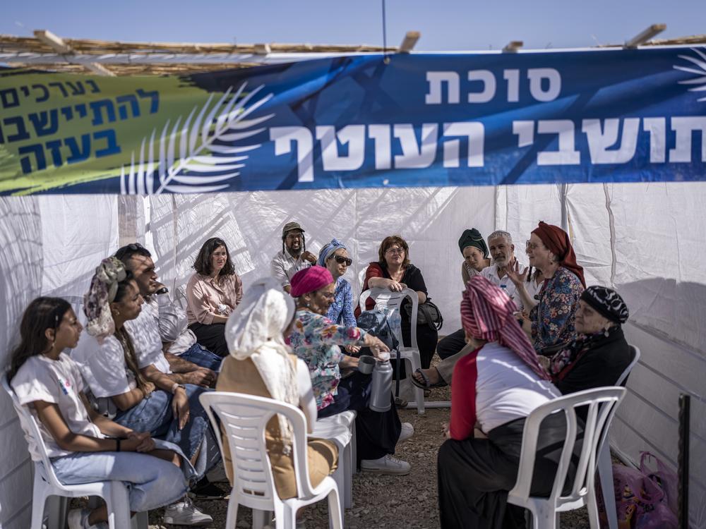 Jewish Israeli activists attend a Sukkot gathering near the Gaza Strip, where far-right activists and members of the Israeli Knesset hold an event billed as 