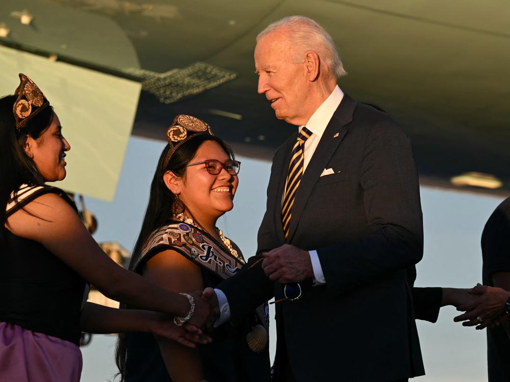 President Biden greets members of a Native American community upon arrival at Phoenix Sky Harbor International Airport on Thursday.