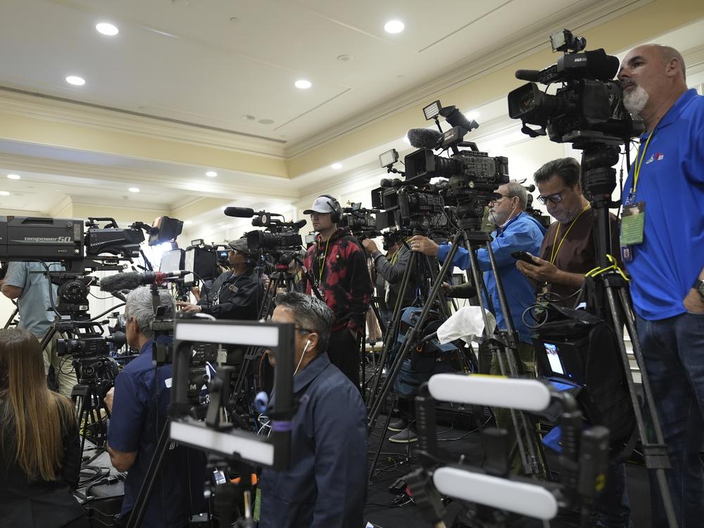 Members of the media cover a roundtable that former President Donald Trump, the Republican presidential nominee, participated in with Latino leaders on Oct. 22 in Doral, Florida.