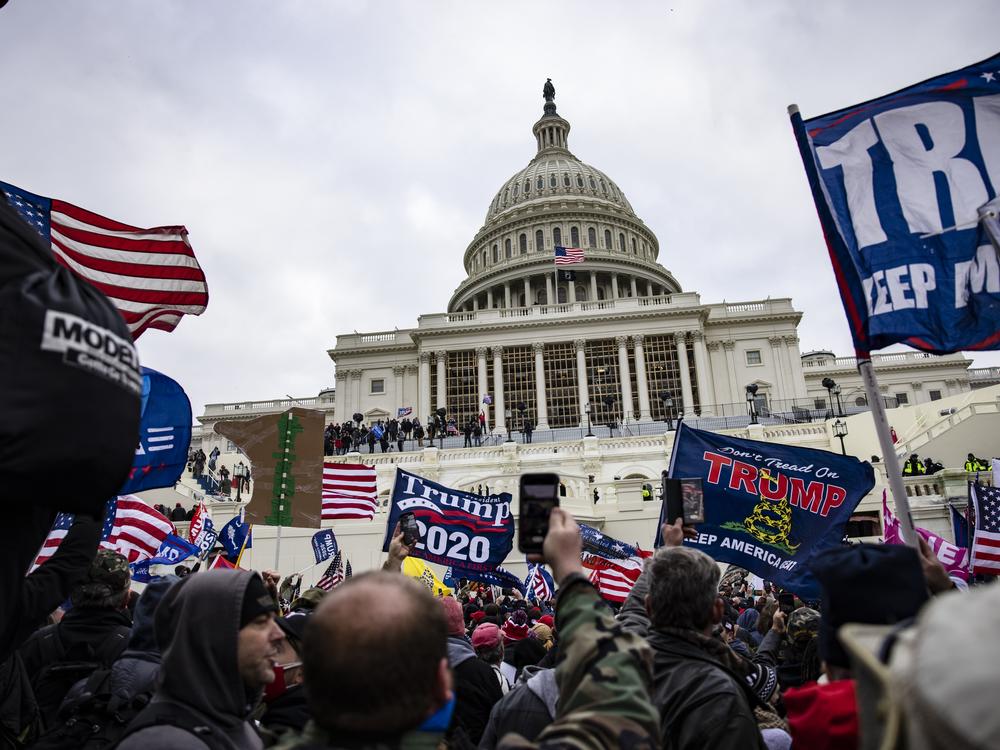 Pro-Trump supporters storm the U.S. Capitol on January 6, 2021. Ahead of the 2024 election results, civil society groups are working to prevent future violence.