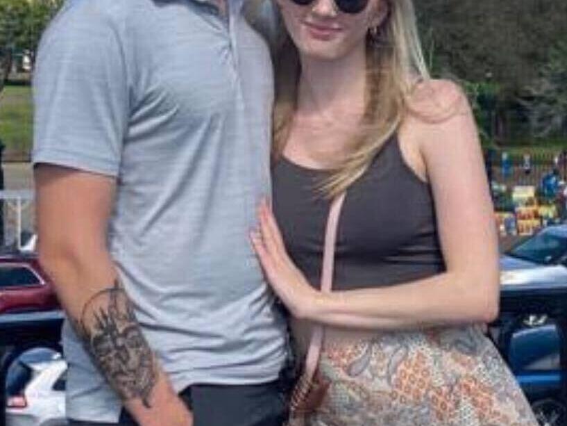 Josh Abate and his wife, Ashley. His tattoo depicts the Four Horsemen of the Apocalypse, from the Bible’s Revelations 6.
