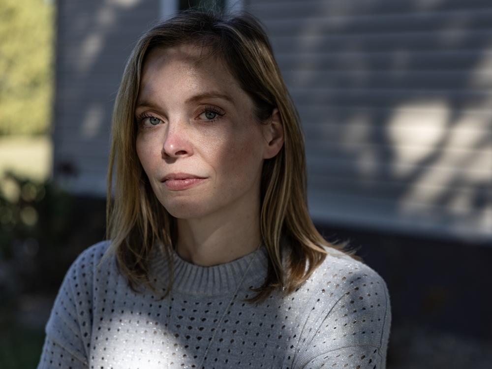 Dr. Emily Boevers, an OBGYN based in Waverly, Iowa, poses for a portrait at her family's farm in nearby Tripoli. She says the state's rape exception requirements threaten the privacy, trust and intimacy of the patient-doctor relationship.