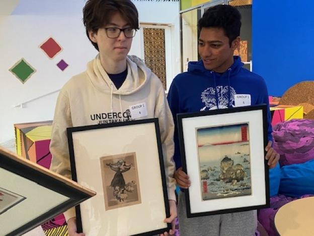 University of Chicago students Anuar Kul-Mukhammed and Rudra Patel show off their selections: works by Goya and Hiroshige.