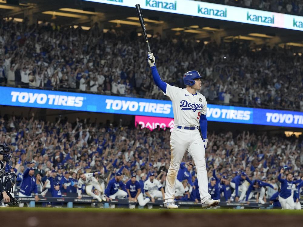 Los Angeles Dodgers' Freddie Freeman celebrates his walk-off grand slam home run against the New York Yankees during the 10th inning in Game 1 of the baseball World Series on Friday in Los Angeles.