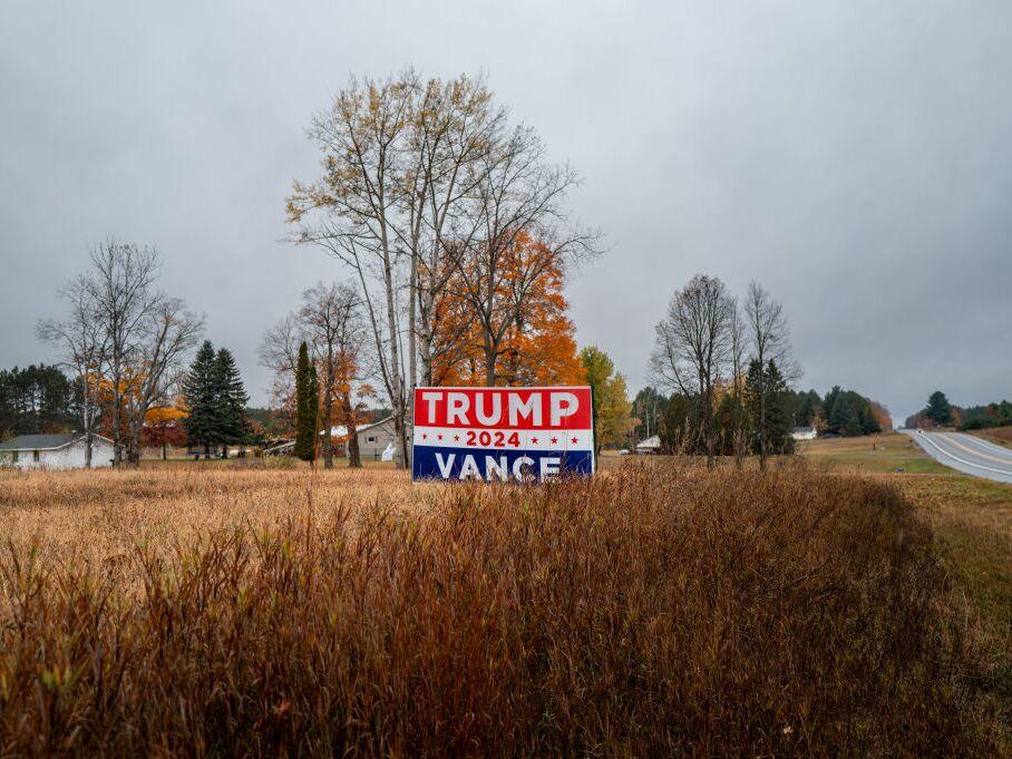 A Trump-Vance campaign sign is displayed in a field on Oct. 25 in Kalkaska, Michigan.