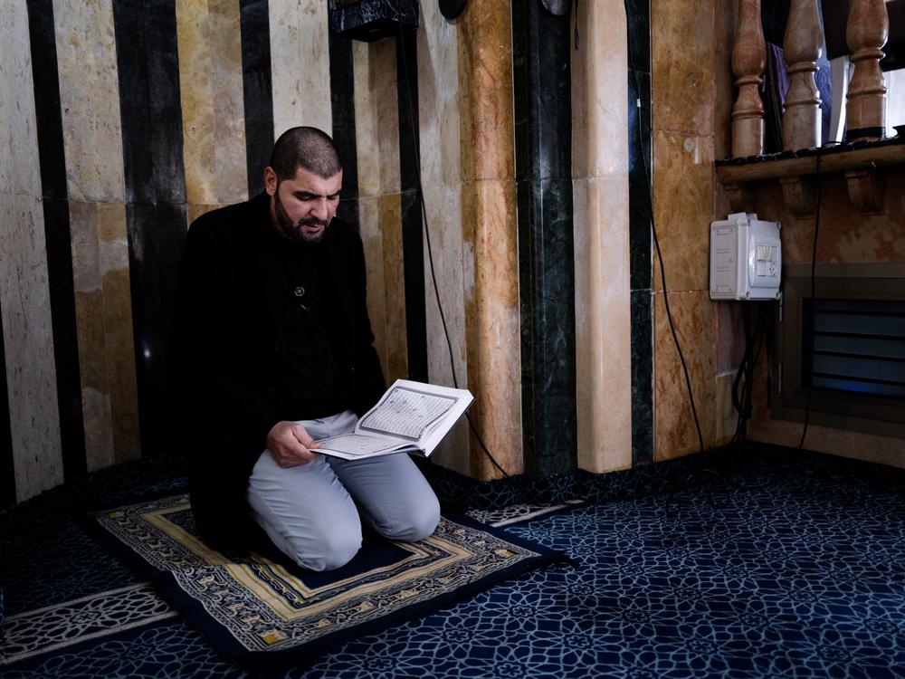Imam Bilal Dekkeh leads prayer inside Jabalieh Mosque in Jaffa. “Any Friday sermon about Gaza, and the police will arrest you,” he says.