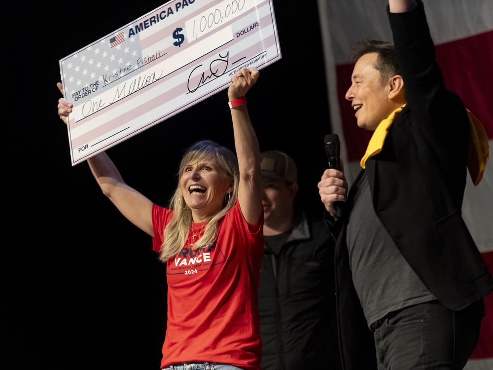 SpaceX and Tesla founder Elon Musk awarded Kristine Fishell with a $1 million check on Oct. 20. The legality of these cash prizes has been called into question.