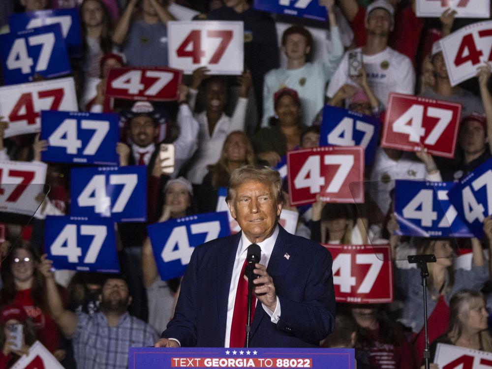 Former President Donald Trump speaks at a campaign rally at McCamish Pavilion on the campus of the Georgia Institute of Technology in Atlanta on Monday. Trump's final campaign rallies have included stumbles, gaffes and profanity as he says farewell to campaigning.