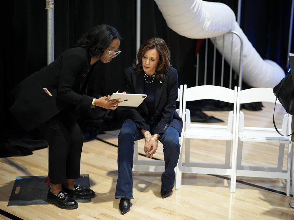 Vice President Harris gets ready backstage before speaking during a campaign rally on Oct. 27, 2024 in Philadelphia.