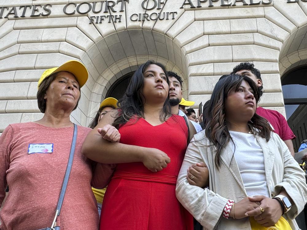 Supporters rally outside the 5th Circuit Court of Appeals in New Orleans on Thursday, Oct. 10, 2024, following a hearing on the future of the Deferred Action for Childhood Arrivals program. A separate lawsuit, filed in a federal district court in North Dakota, challenges a rule allowing DACA recipients to enroll in Affordable Care Act plans this year.