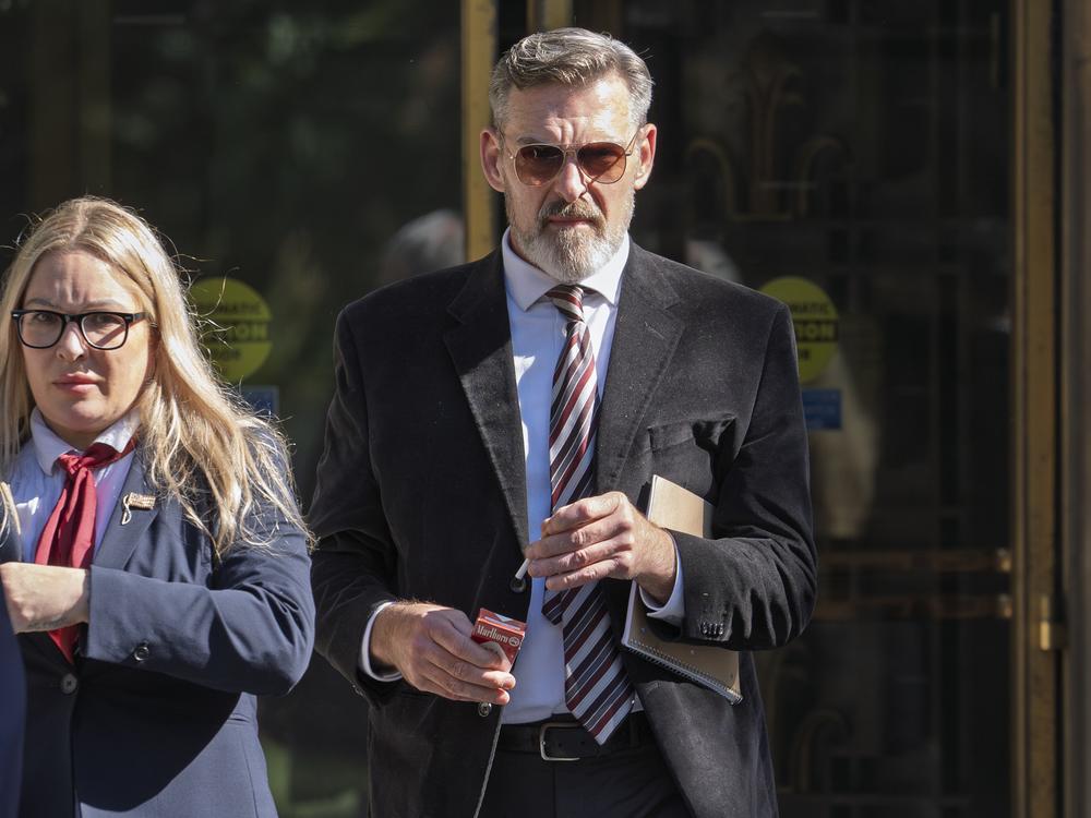Actor Jay Johnston emerges from the U.S. District Courthouse in Washington, Monday, Oct. 28, 2024, after being sentenced to one year in prison for his part in a mob’s attack on the U.S. Capitol nearly four years ago.
