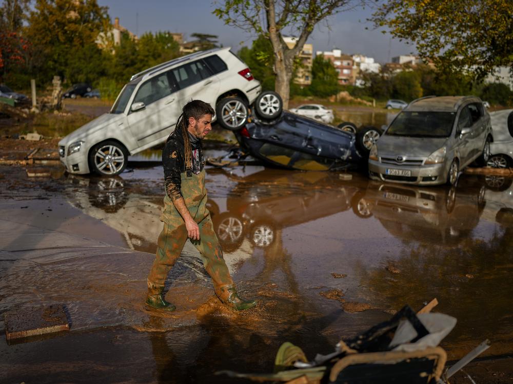 Flooded cars are piled up in Utiel, Spain on Wednesday.