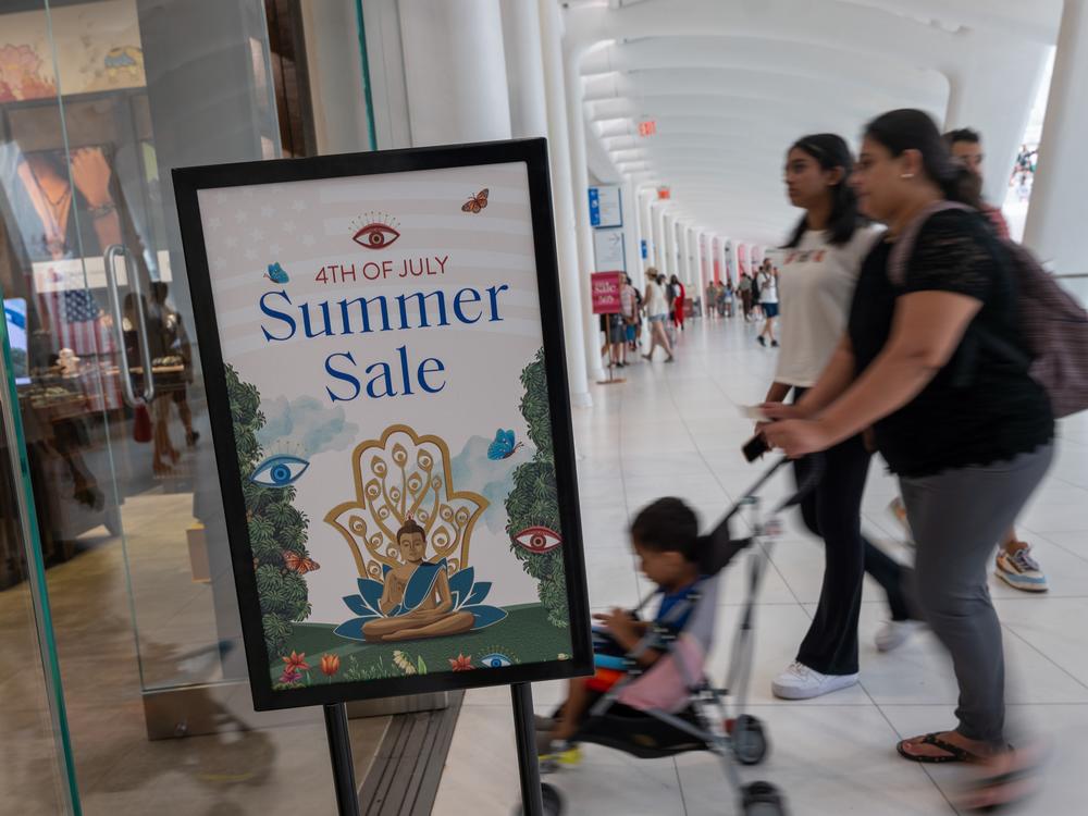 People walk through a mall in Manhattan on July 5, 2024. The economy grew an annual rate of 2.8% in the July to September quarter, a solid pace of expansion.