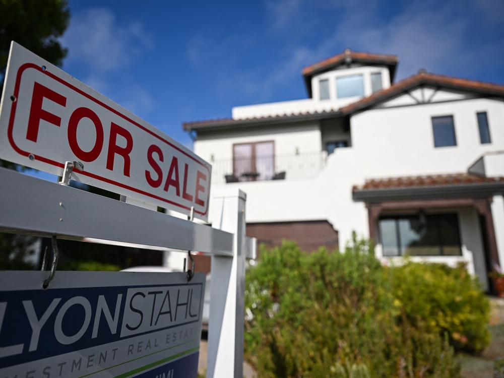 A for sale sign is displayed outside of a home for sale on Aug. 16, 2024 in Los Angeles.