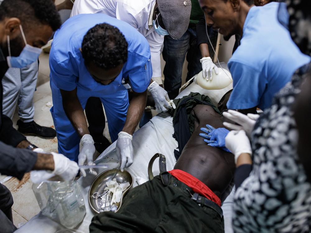 Doctors attempt to resuscitate a victim of shelling at the Al-Nao Hospital in Omdurman, Sudan, on Sept. 5. The victim was later announced dead.