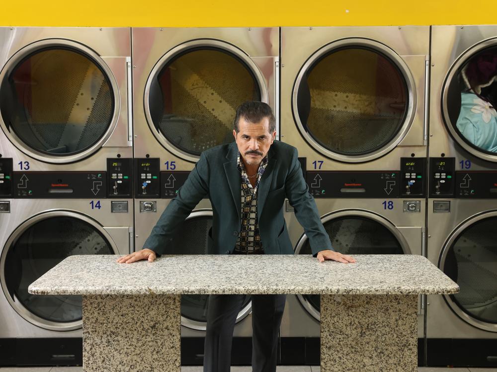 In his new play <em>The Other Americans</em>, John Leguizamo is Nelson Castro, owner of a chain of laundromats in Queens, N.Y.