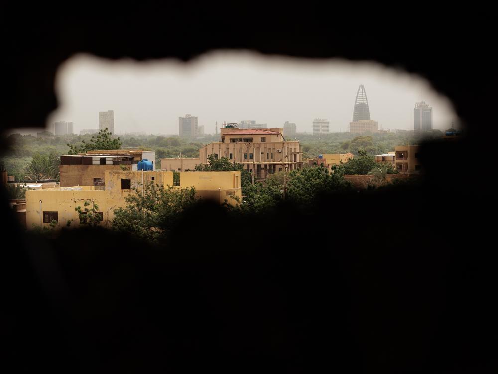 The city of Khartoum is seen through a hole in the wall used by an RSF sniper, at Sudan's Omdurman Maternity Hospital, on Sept. 7.