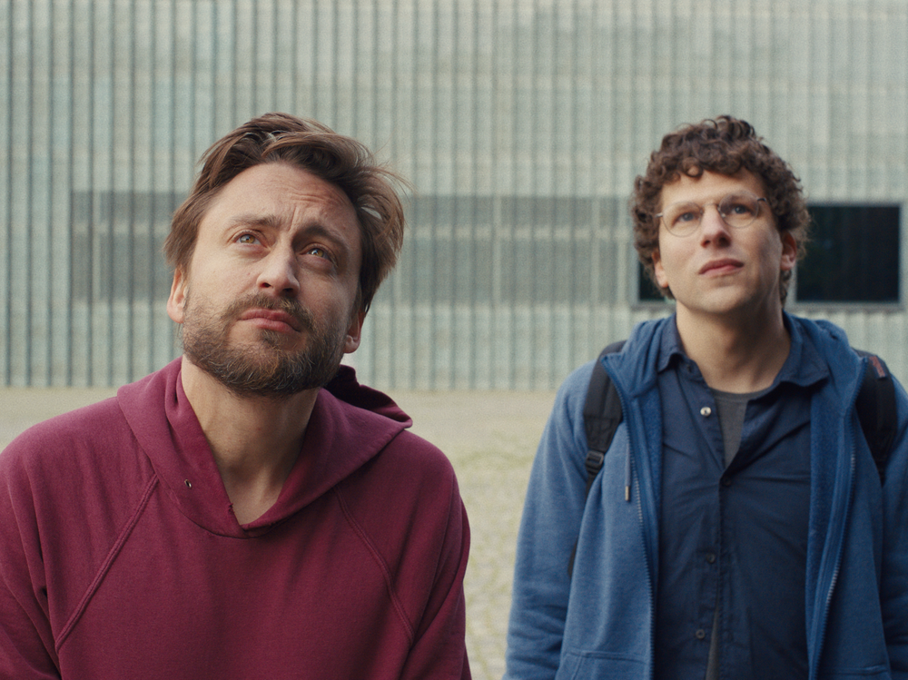 Cousins Benji (Kieran Culkin) and David (Jesse Eisenberg) tour through Poland to honor their beloved grandmother in <em>A Real Pain.</em>