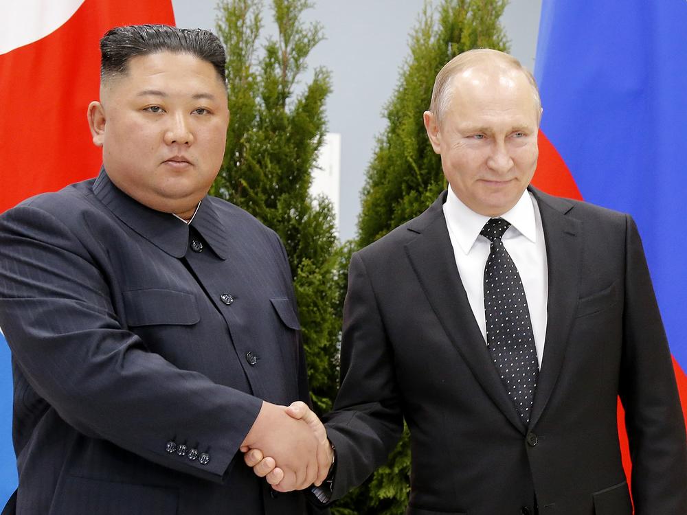 Russian President Vladimir Putin, right, and North Korea's leader Kim Jong Un shake hands during their meeting in Vladivostok, Russia, on April 25, 2019.