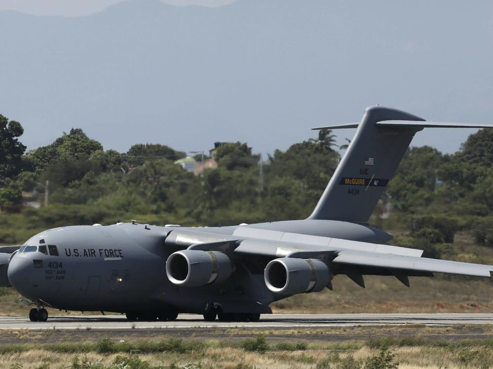 A United States Air Force C-17 cargo plane loaded with humanitarian aid lands at Camilo Daza airport in Cucuta, Colombia, on Feb. 16, 2019.