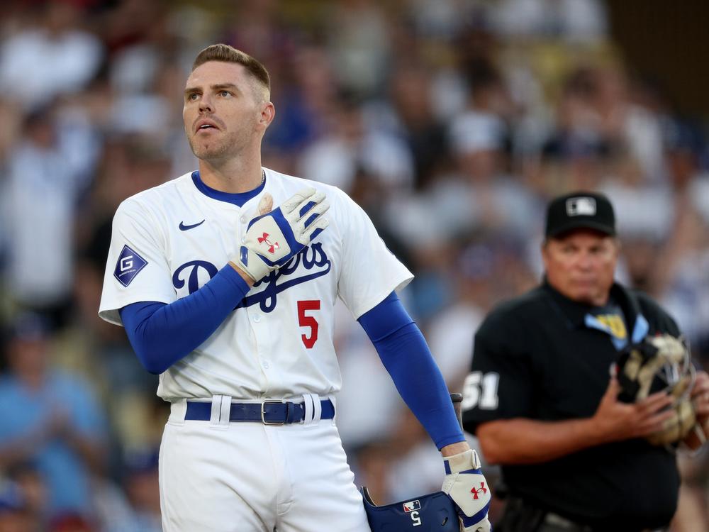 Freddie Freeman acknowledges applause from fans at the plate as he returns to the lineup on August 5, 2024 after missing eight games to be with his son who had been hospitalized.